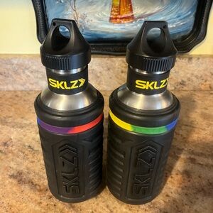 SKLZ Silver and Black Water Bottle with Screw Off Cap. 27 Oz.